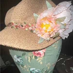 Woven Woman’s Newsie Cap with Pink Floral Embellishments